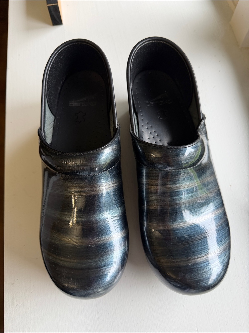 Dansko Women's Black Multi-Stripe Patent Clogs